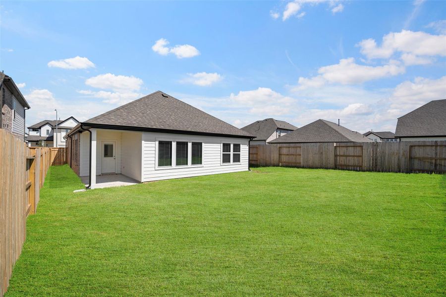 Large backyard offering room for outdoor dining, play, or future upgrades. Large backyard offering room for outdoor dining, play, or future upgrades.