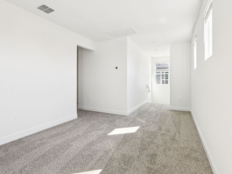 Spacious, unfurnished interior of a new home in Cyrene at Minneola - Villas, Minneola (Image 10). Spacious, unfurnished interior of a new home in Cyrene at Minneola - Villas, Minneola (Image 10).