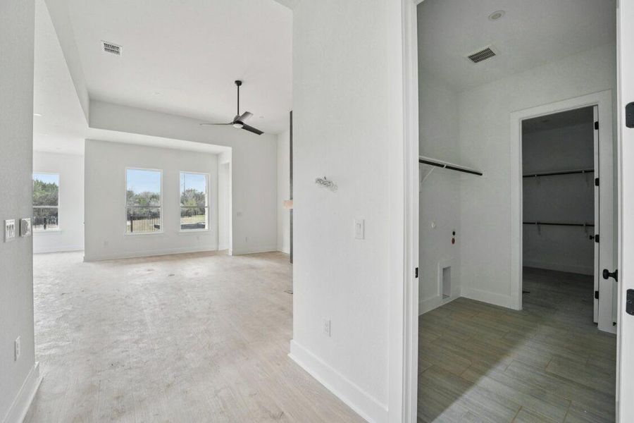 Photos are of a completed model of the same floor plan and are for illustrative purposes only. Actual home is under construction and design selections, materials, and features may differ. Confirm final specifications with the New Home Consultant. Photos are of a completed model of the same floor plan and are for illustrative purposes only. Actual home is under construction and design selections, materials, and features may differ. Confirm final specifications with the New Home Consultant.
