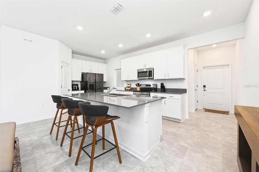 Furnished interior view inside a new home in Tohoqua, Kissimmee (Image 8).