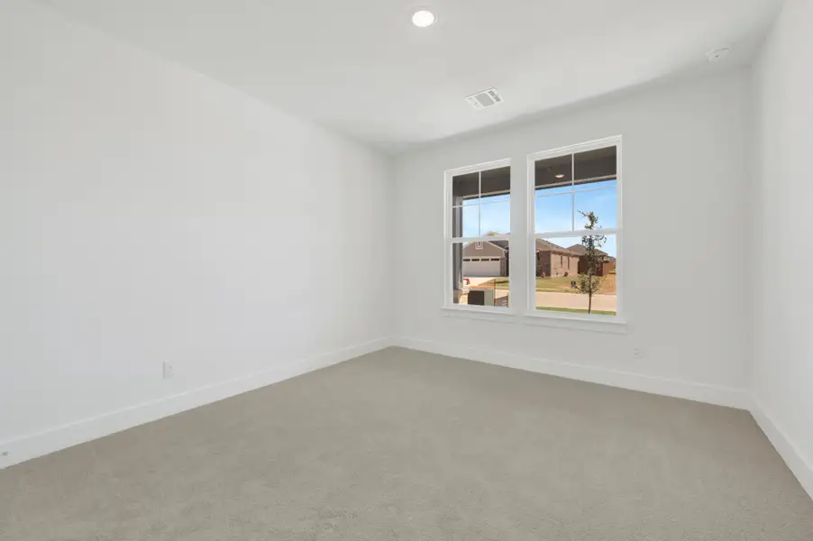 Spacious, unfurnished interior of a new home in The Meadows, Denton (Image 20).