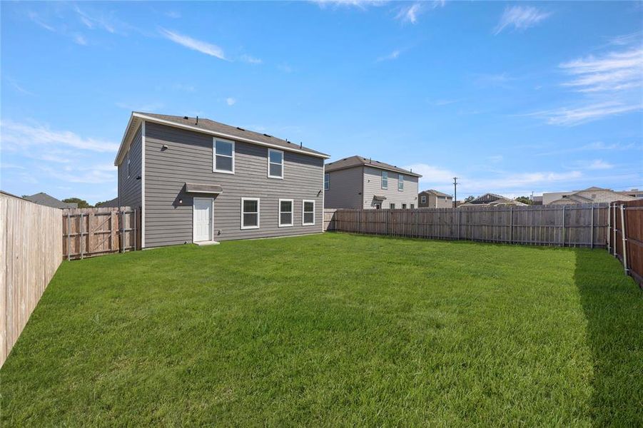 Exterior details and patio area of a home in Labein Villas, Greenville (Image 2). Exterior details and patio area of a home in Labein Villas, Greenville (Image 2).
