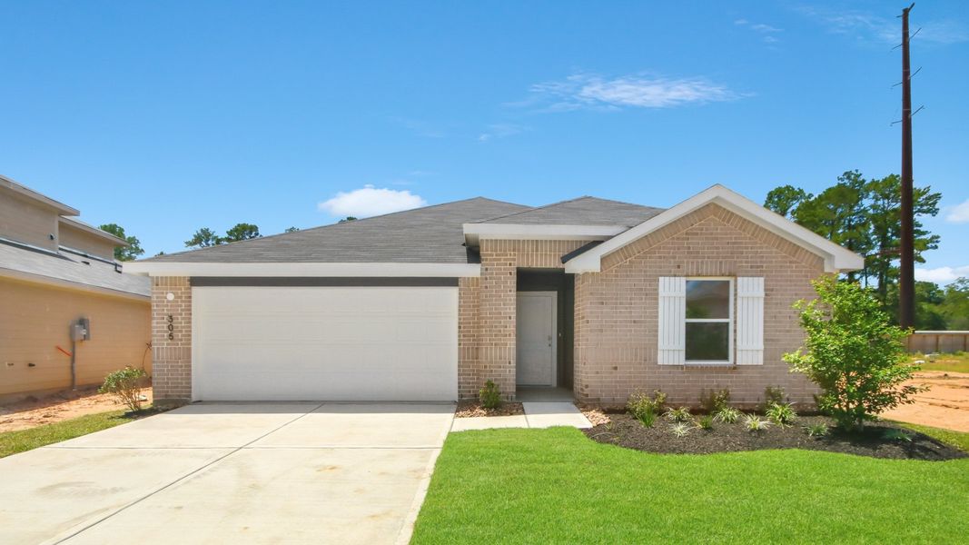 Front exterior of a new home in Maple Woods, Hockley, TX, highlighting curb appeal (Image 1). Front exterior of a new home in Maple Woods, Hockley, TX, highlighting curb appeal (Image 1).
