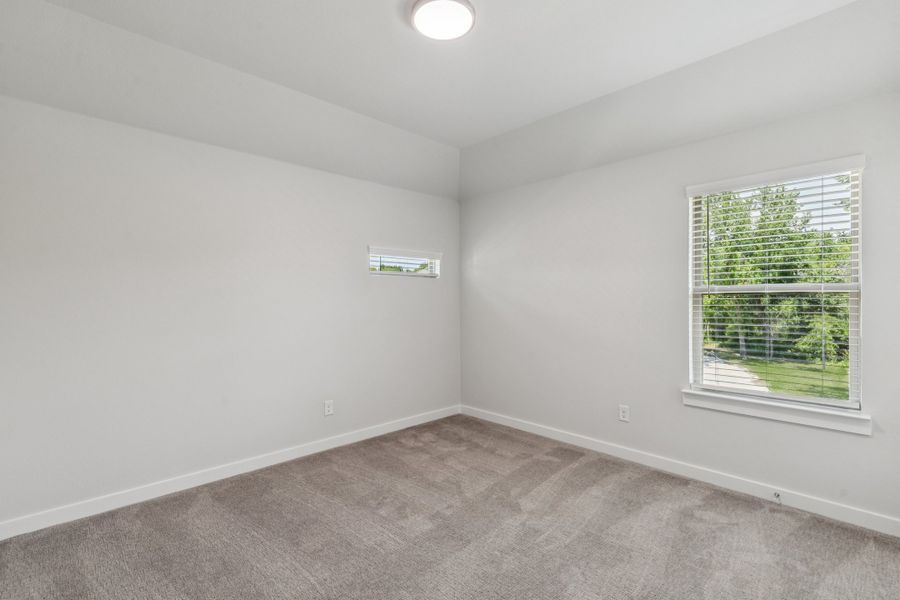 Bedroom in the Mercury home plan by Trophy Signature Homes – REPRESENTATIVE PHOTO Bedroom in the Mercury home plan by Trophy Signature Homes – REPRESENTATIVE PHOTO