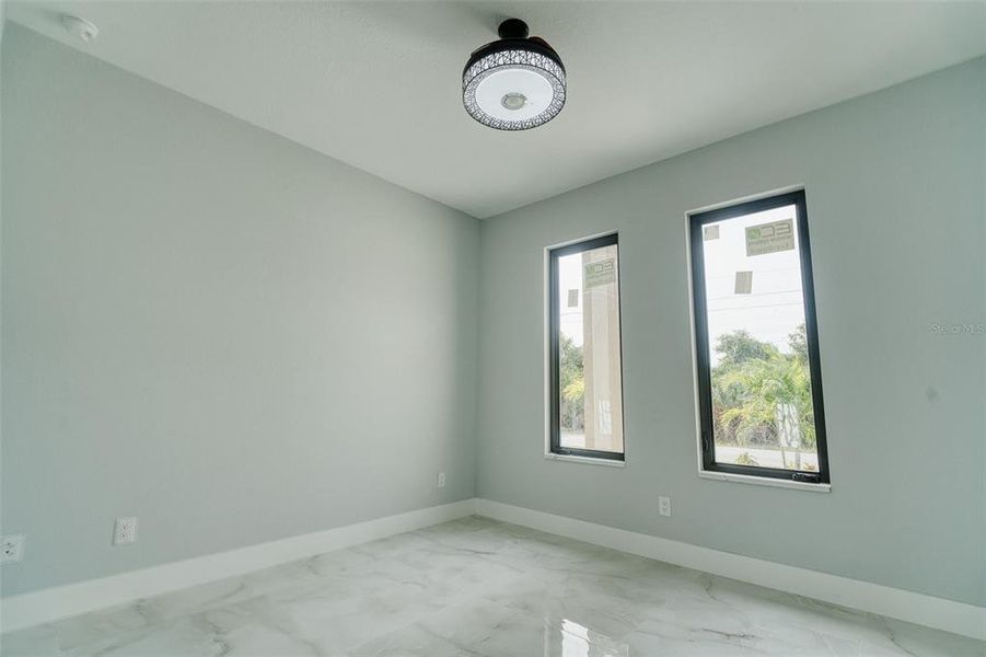 Spacious, unfurnished interior of a new home in , Port Charlotte (Image 41).