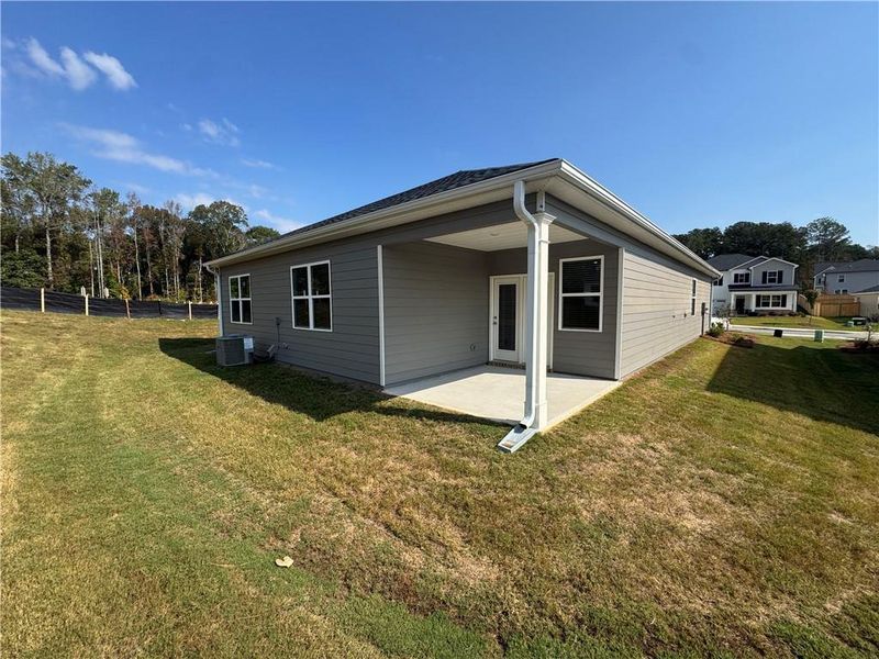 Exterior details and patio area of a home in Oakchase at Hampton, Hampton (Image 2).