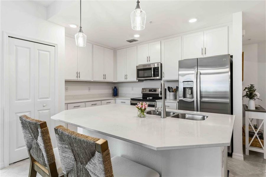 Furnished interior view inside a new home in Wellen Park Golf & Country Club, Venice (Image 8).