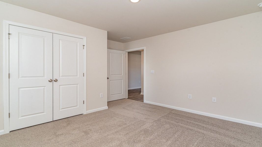 Spacious, unfurnished interior of a new home in Stanbury Creek, Supply (Image 8).