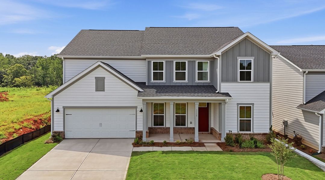 Front exterior of a new home in Sweetwater Hills, Moore, SC, highlighting curb appeal (Image 26).
