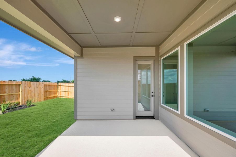Exterior details and patio area of a home in The Grand Prairie - Meadow Collection, Hockley (Image 25).