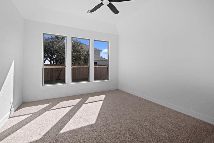 Primary Bedroom with elevated ceiling