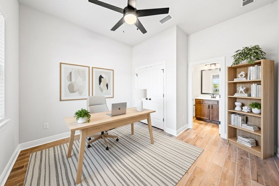 Front exterior of a new home in The Bluffs at Lafayette, Freeport, FL, highlighting curb appeal (Image 18).