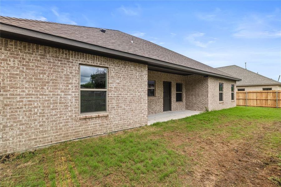 Exterior details and patio area of a home in , Tom Bean (Image 21).