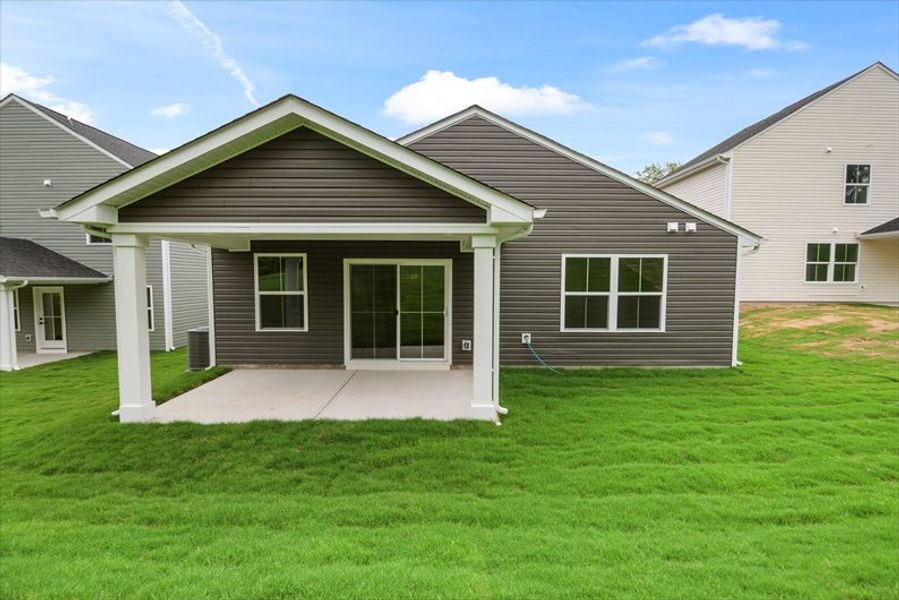 Exterior details and patio area of a home in Baxter Village, Greenville (Image 14). Exterior details and patio area of a home in Baxter Village, Greenville (Image 14).
