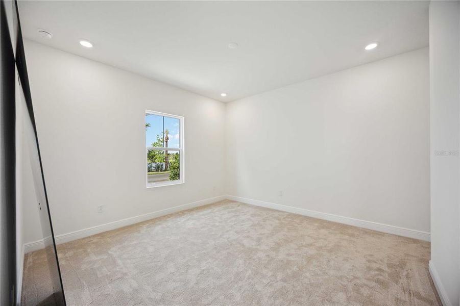 Spacious, unfurnished interior of a new home in Bungalow Walk at Lakewood Ranch, Lakewood Ranch (Image 16).