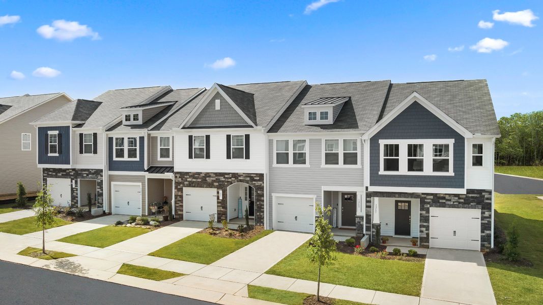 Front exterior of a new home in North First Street Townes, Mebane, NC, highlighting curb appeal (Image 1). Front exterior of a new home in North First Street Townes, Mebane, NC, highlighting curb appeal (Image 1).