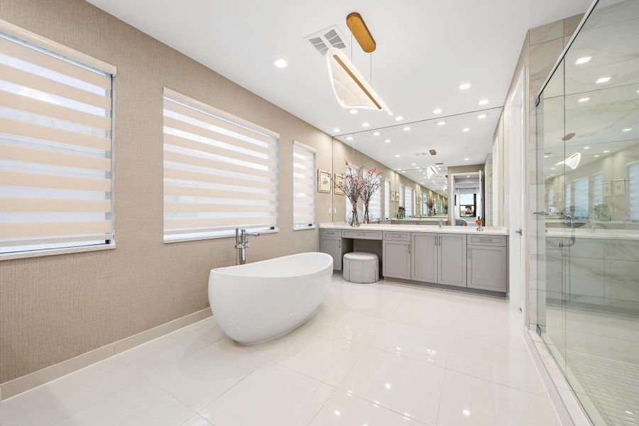 Designer lighting, wallpaper, and custom blinds.