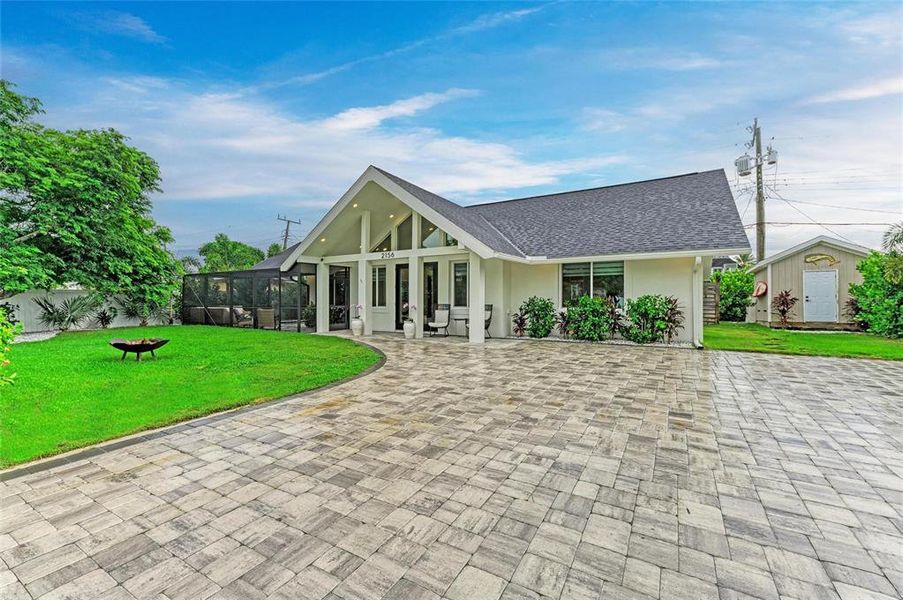 Front exterior of a new home in , Sarasota, FL, highlighting curb appeal (Image 19). Front exterior of a new home in , Sarasota, FL, highlighting curb appeal (Image 19).