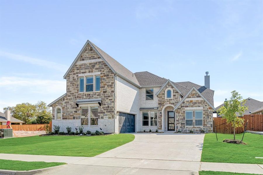 Front exterior of a new home in Ridgepoint, Midlothian, TX, highlighting curb appeal (Image 25). Front exterior of a new home in Ridgepoint, Midlothian, TX, highlighting curb appeal (Image 25).