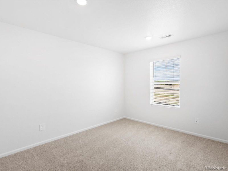 Spacious, unfurnished interior of a new home in Poudre Heights: The Lakes Collection, Windsor (Image 22).