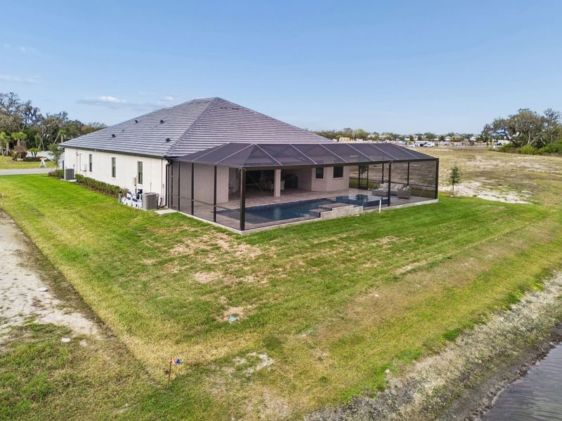 Exterior details and patio area of a home in River Preserve Estates, Parrish (Image 49).