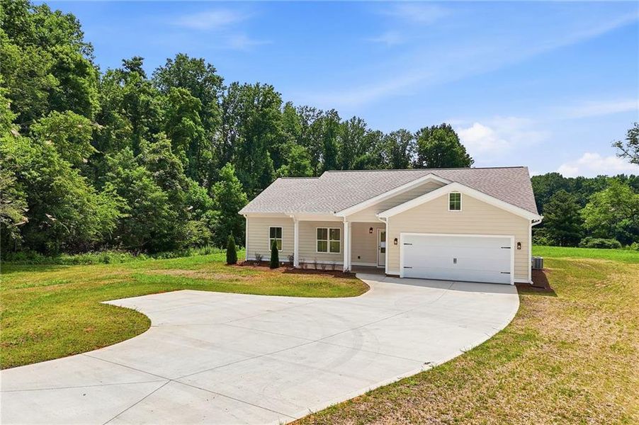 Front exterior of a new home in , Jasper, GA, highlighting curb appeal (Image 21).