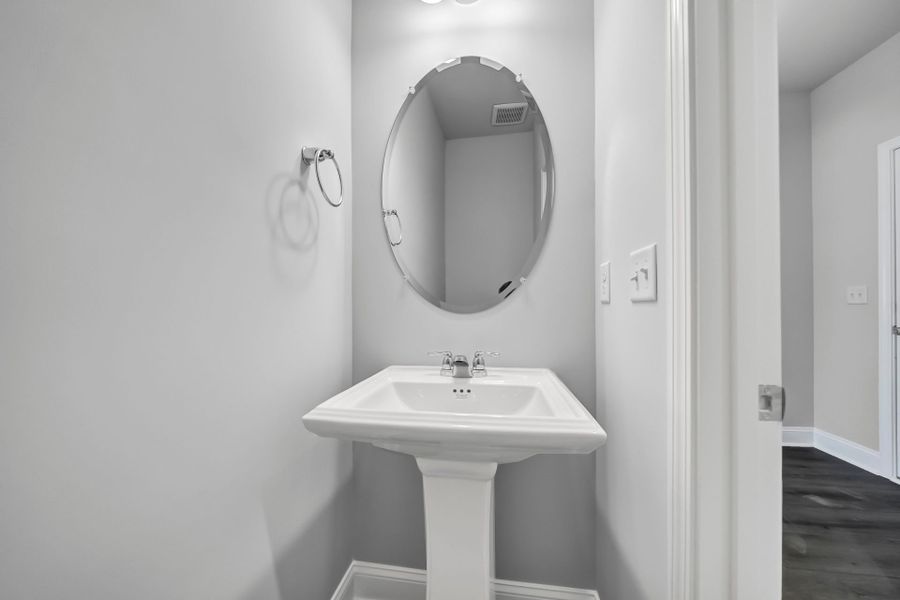 Furnished interior view inside a new home in Monroe Preserve, Chapin (Image 9).