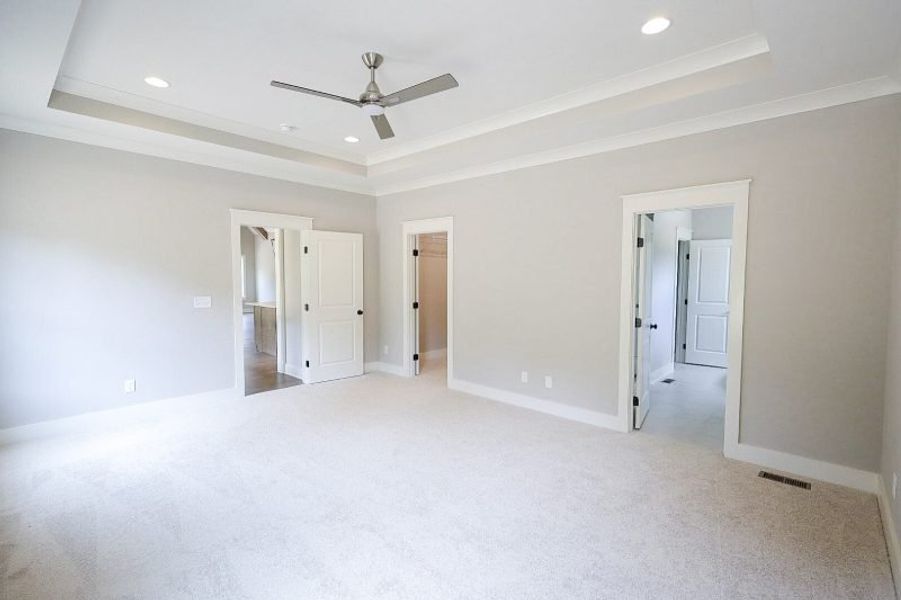 Spacious, unfurnished interior of a new home in Baker Road, Birchwood (Image 63).