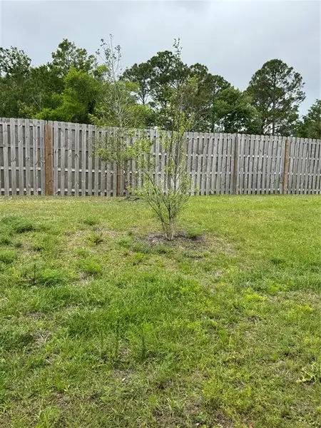 Exterior details and patio area of a home in Ravenswood Village, St. Augustine (Image 4).