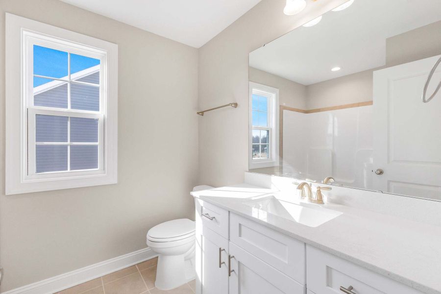 Representative furnished interior of a home built from the Clayton by Caviness & Cates Communities in Bartlett Manor, Youngsville (Image 209).