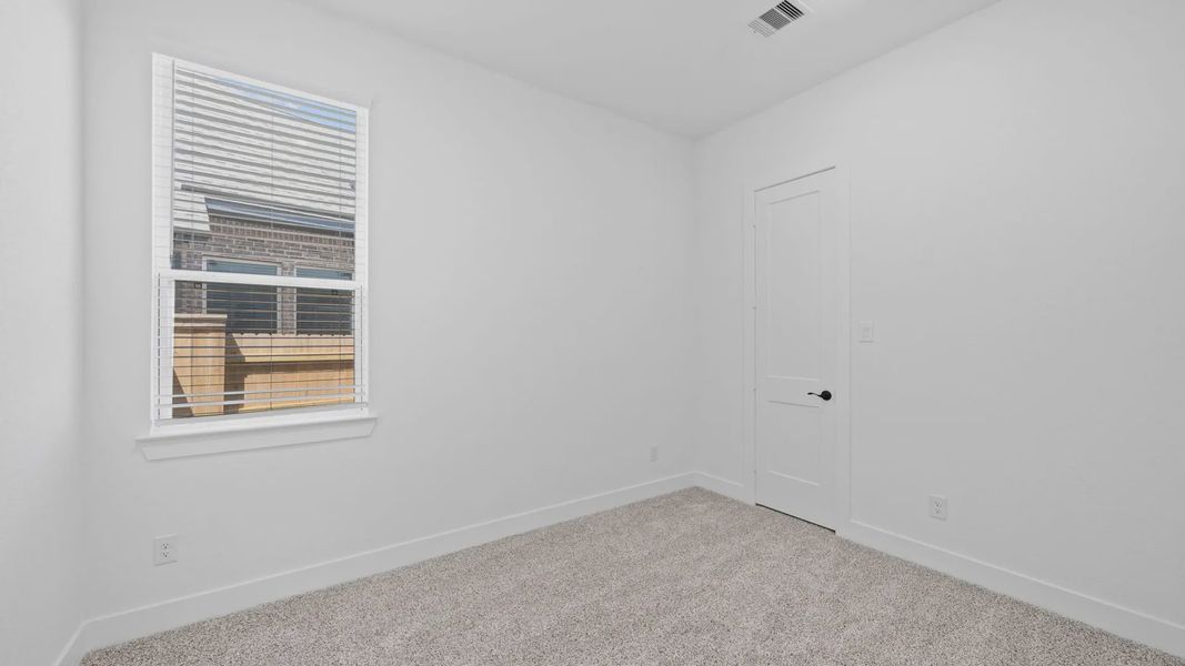 Representative unfurnished interior of a home built from the Rivers by Chesmar Homes in Sofi Lakes, Katy (Image 29).