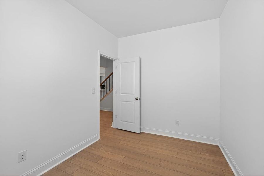 Spacious, unfurnished interior of a new home in Bailey Fence, Dacula (Image 26).