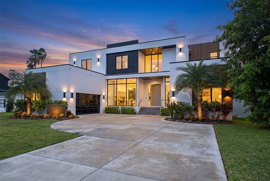 Front exterior of a new home in , St. Petersburg, FL, highlighting curb appeal (Image 1). Front exterior of a new home in , St. Petersburg, FL, highlighting curb appeal (Image 1).