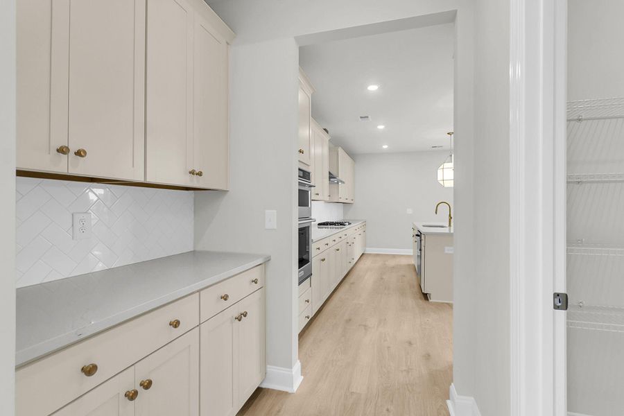 Furnished interior view inside a new home in Tidewater at Lakes of Cane Bay, Summerville (Image 5).