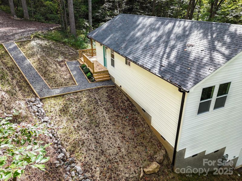 Exterior details and patio area of a home in , Asheville (Image 24).