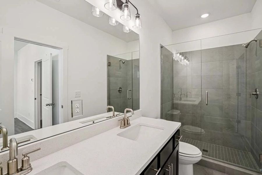 Primary Bathroom featuring Industrial Collection Finishes Primary Bathroom featuring Industrial Collection Finishes