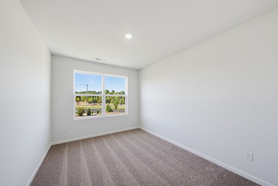 Spacious, unfurnished interior of a new home in Sweetbrier, Durham (Image 27).
