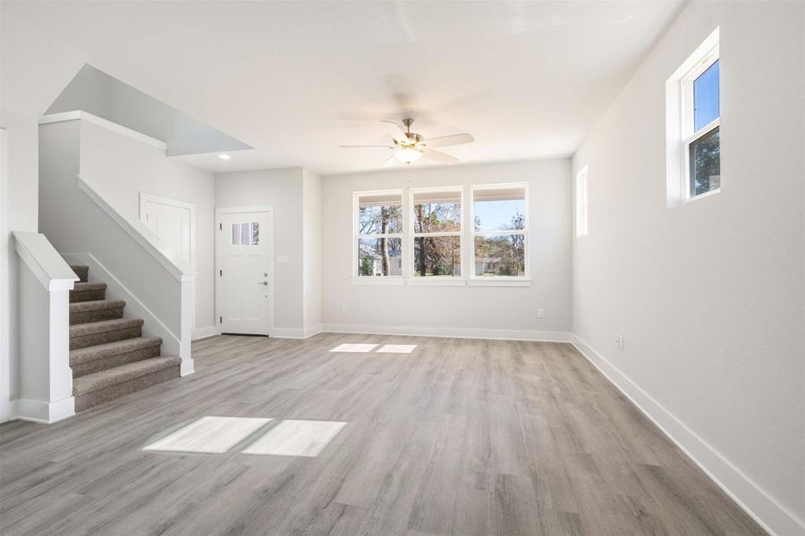 Windows in Front Living Room provide morning light