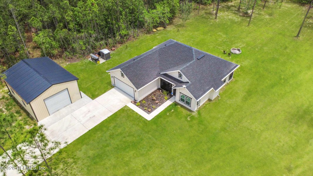 Front exterior of a new home in , Hastings, FL, highlighting curb appeal (Image 23).