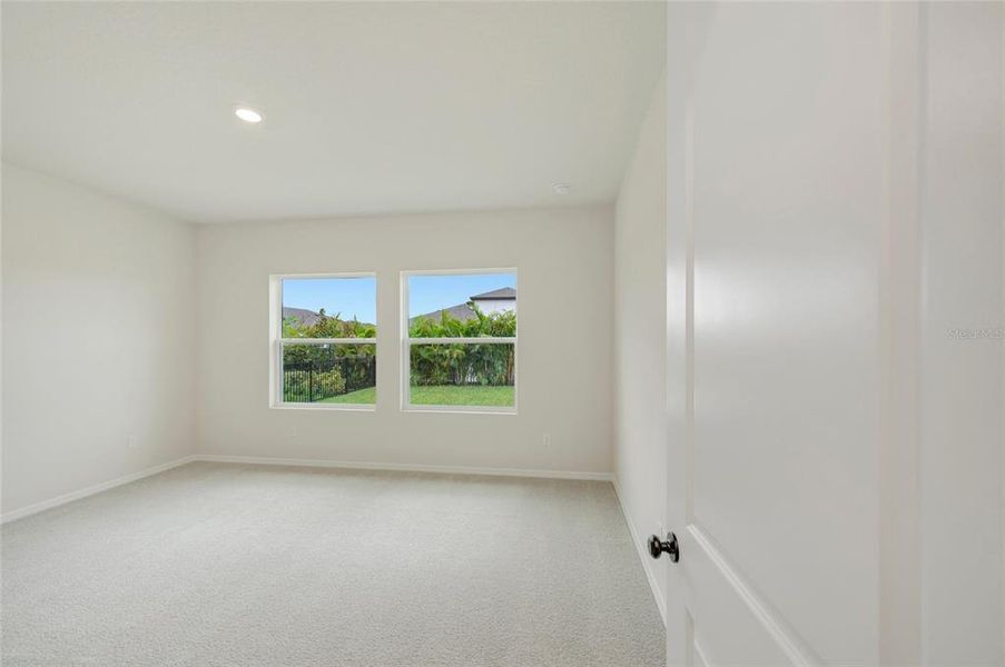 Spacious, unfurnished interior of a new home in Waterset Tradition Series, Apollo Beach (Image 16).