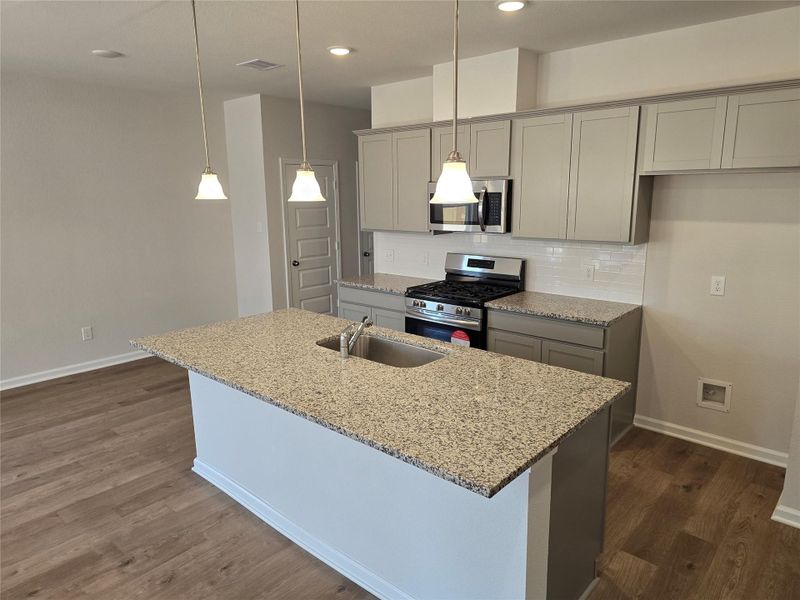 The Shetland III- Kitchen. Home under construction, photo used for illustrative purposes only, colors and options will vary.