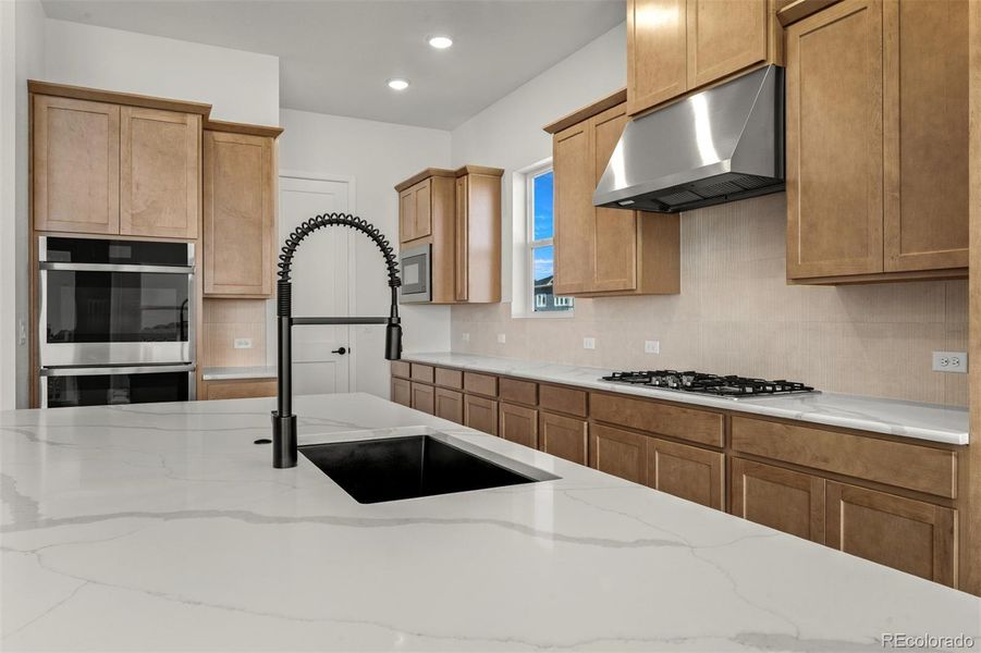 Furnished interior view inside a new home in Wolf Ranch - Enclave Collection, Colorado Springs (Image 6).