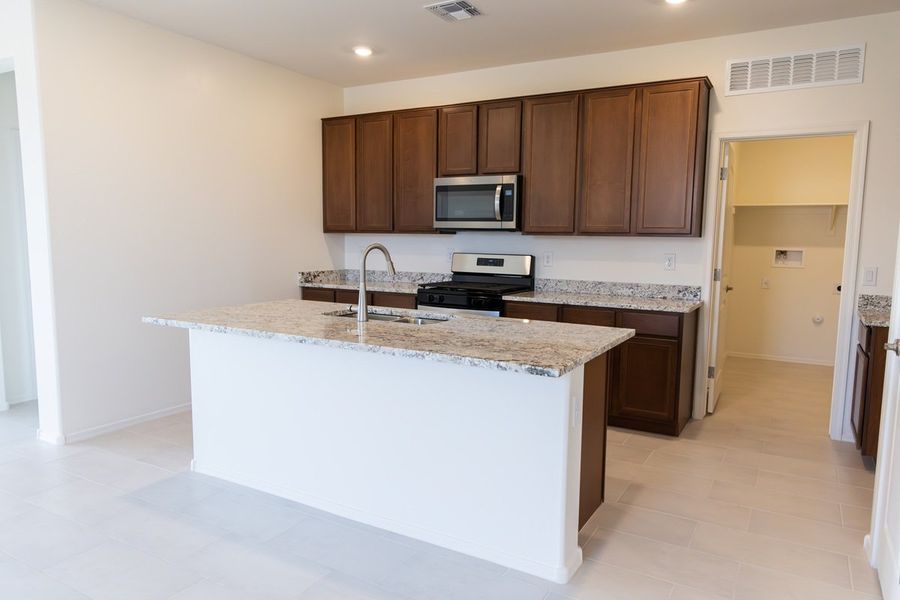 Furnished interior view inside a new home in Colina de Anza Traditions, Tucson (Image 3). Furnished interior view inside a new home in Colina de Anza Traditions, Tucson (Image 3).