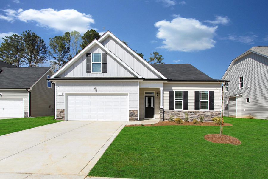 Representative exterior photo of a completed home built from the Hogan by RiverWILD Homes in Maggie Way, Wendell, NC (Image 29). Representative exterior photo of a completed home built from the Hogan by RiverWILD Homes in Maggie Way, Wendell, NC (Image 29).