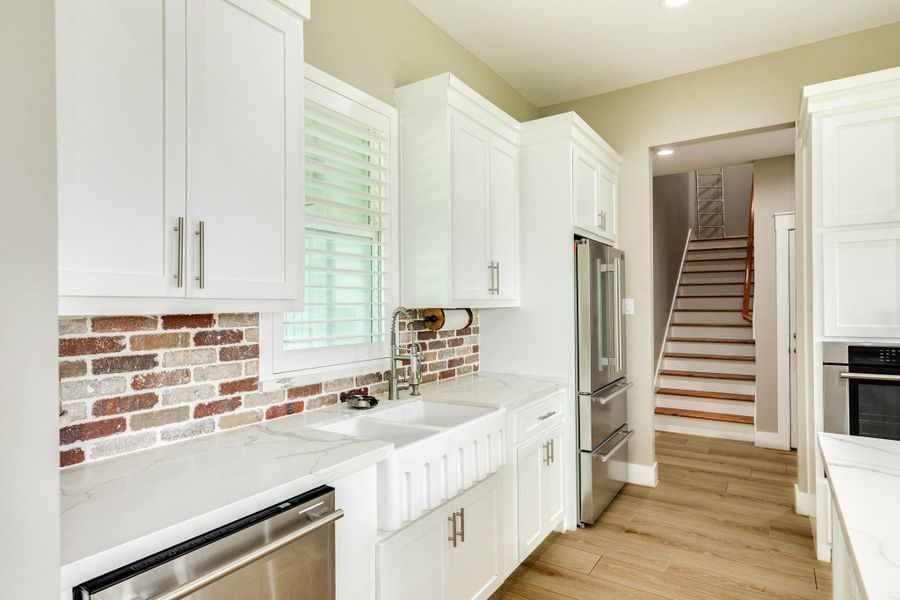 Furnished interior view inside a new home in , Angleton (Image 35).
