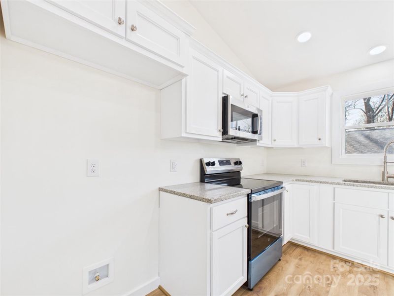 Furnished interior view inside a new home in , Valdese (Image 6).