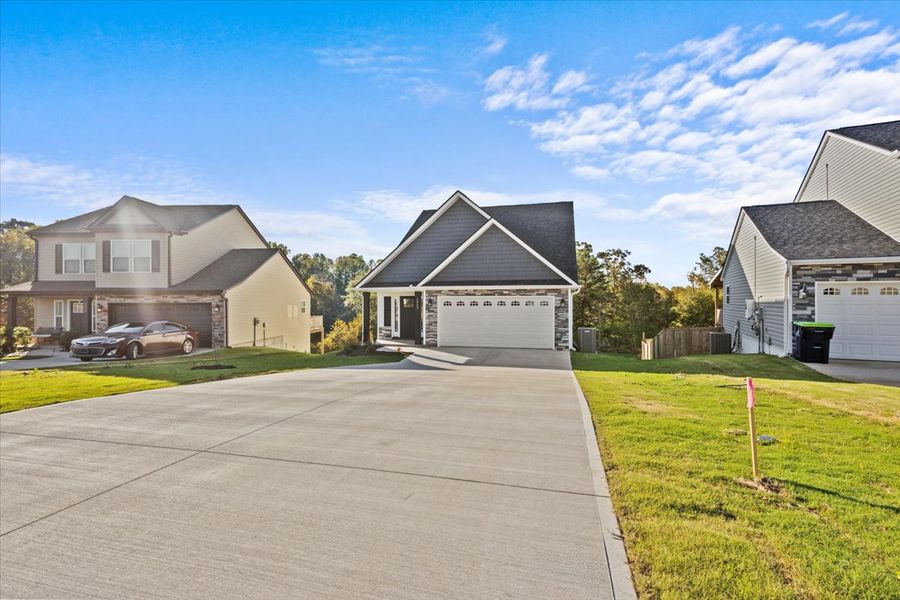 Representative exterior photo of a completed home built from the Iris by Enchanted Homes in Hampshire Heights, Moore, SC (Image 14).