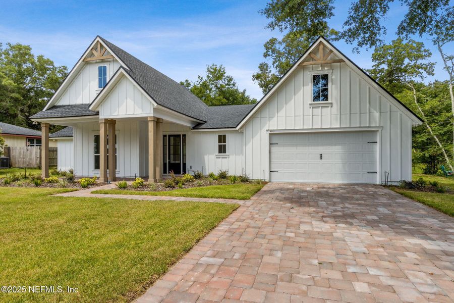 Front exterior of a new home in , Fernandina Beach, FL, highlighting curb appeal (Image 29).