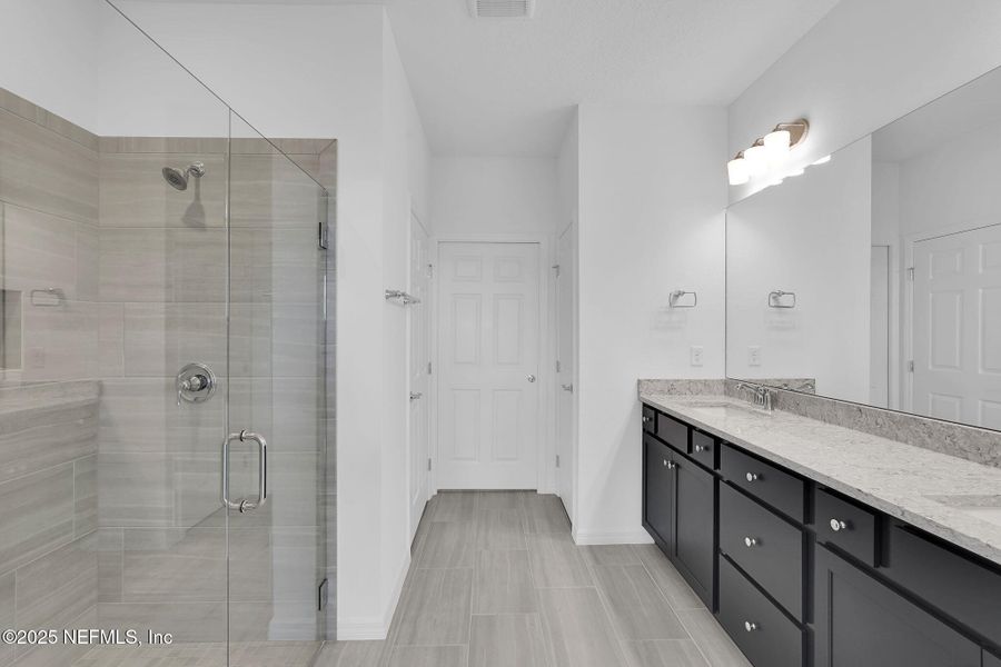 Furnished interior view inside a new home in Del Webb Wildlight, Yulee (Image 8).