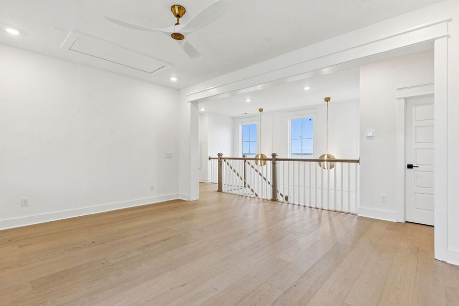 Spacious, unfurnished interior of a new home in Overlook at Copahee Sound, Awendaw (Image 44).